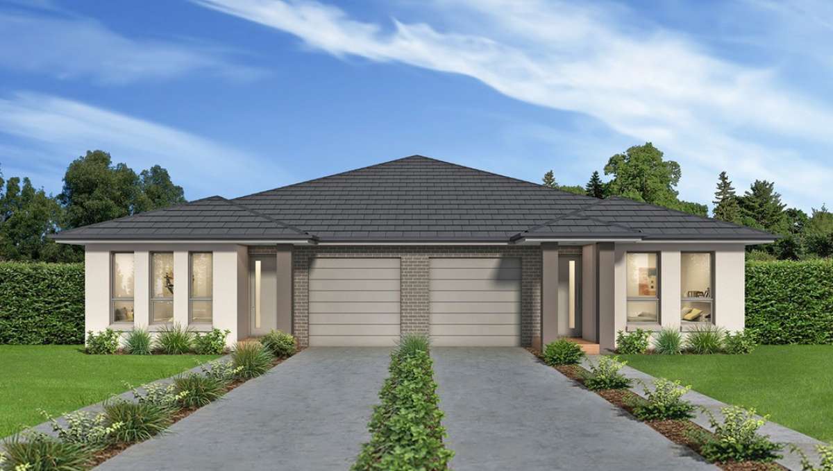 Modern suburban duplex with beige exterior, grey roof, and landscaped lawns.