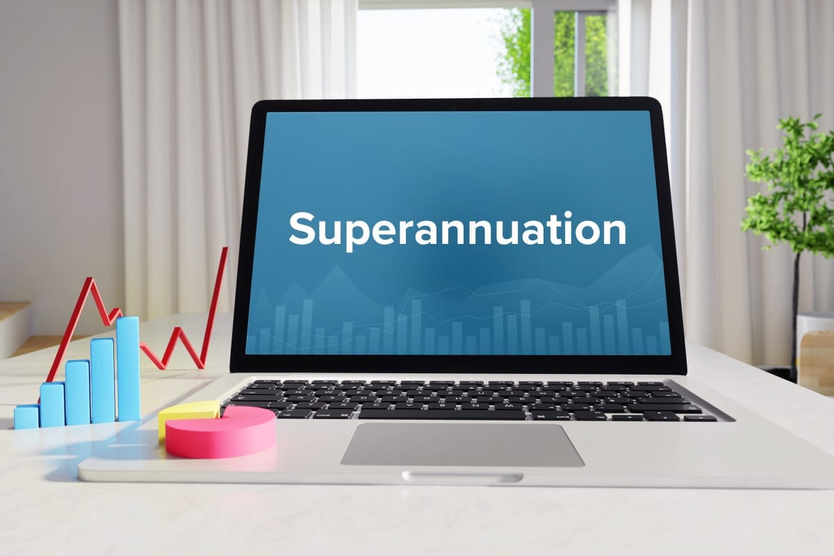 Superannuation financial graphs on laptop in modern, minimalist workspace.