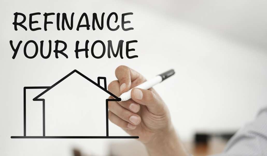Refinance your home loan illustration with hand drawing house outline on whiteboard.
