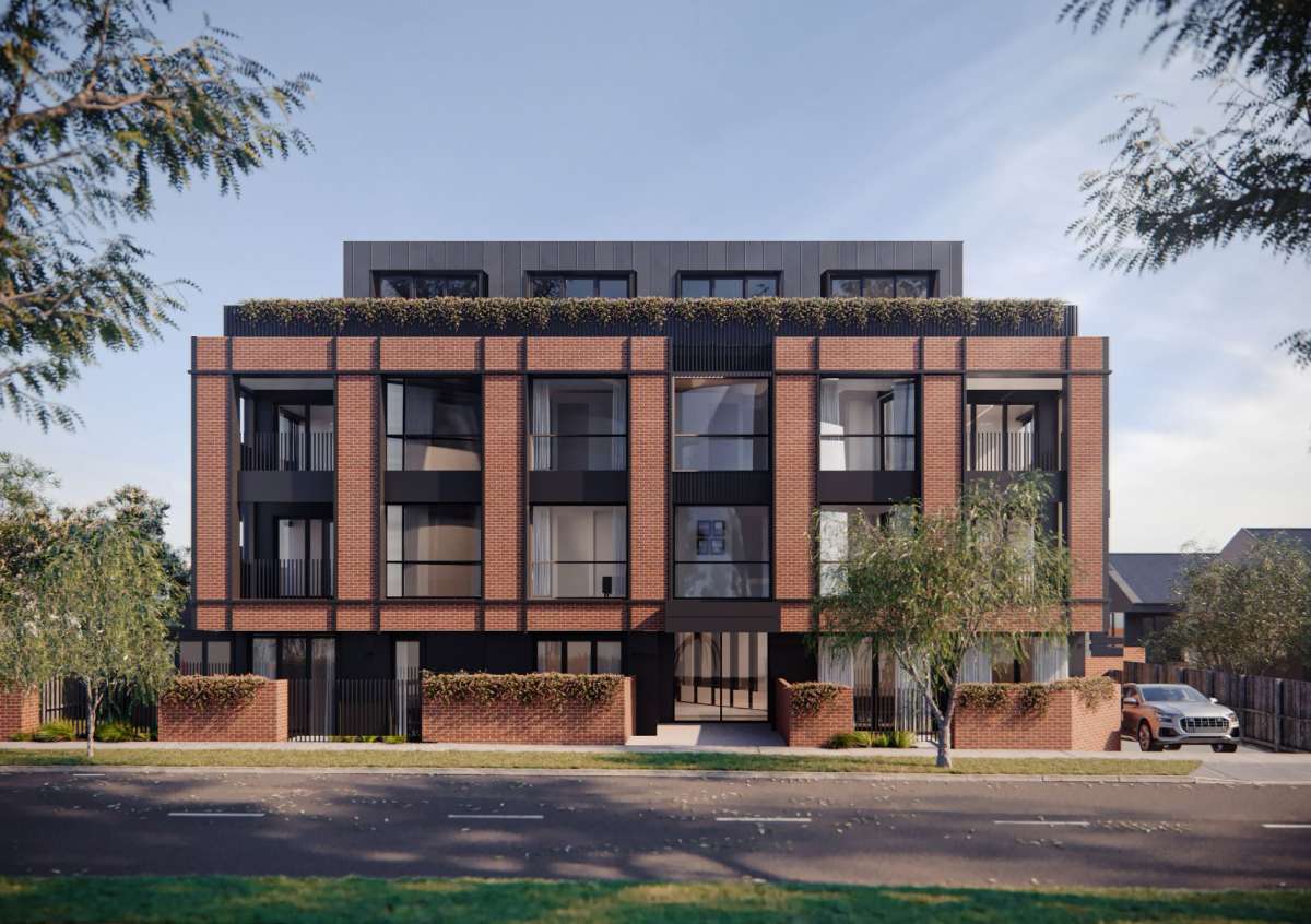 Modern residential building with dark brick, large windows, rooftop terrace, and landscaped garden.