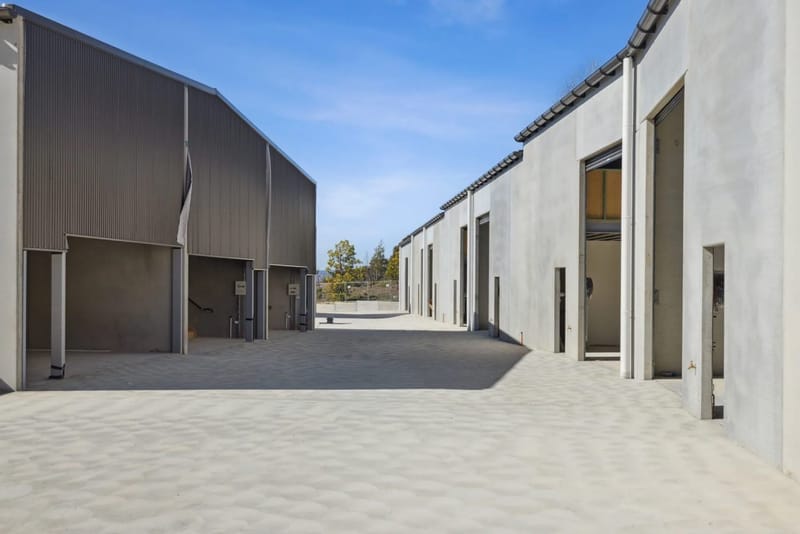 Driveway between two rows of industrial units at Hume