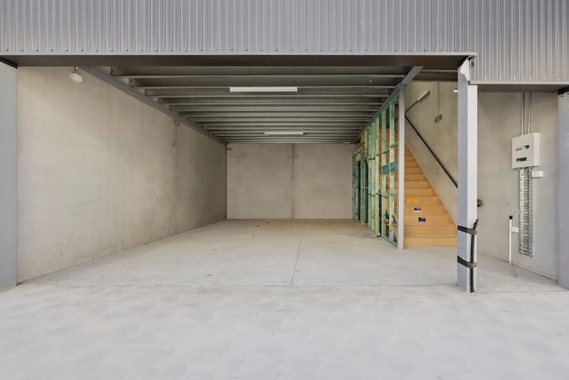 Warehouse interior with internal stair to the mezzanine