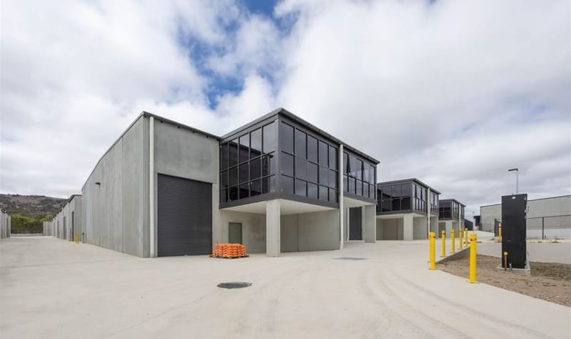 Industrial units with glazed offices above roller door entries